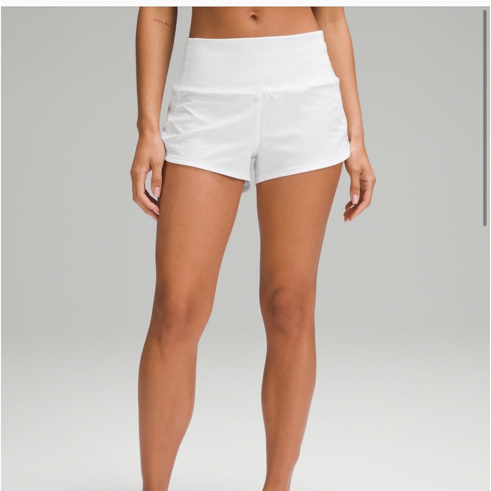 Lululemon white speed up high rise shorts in size 6